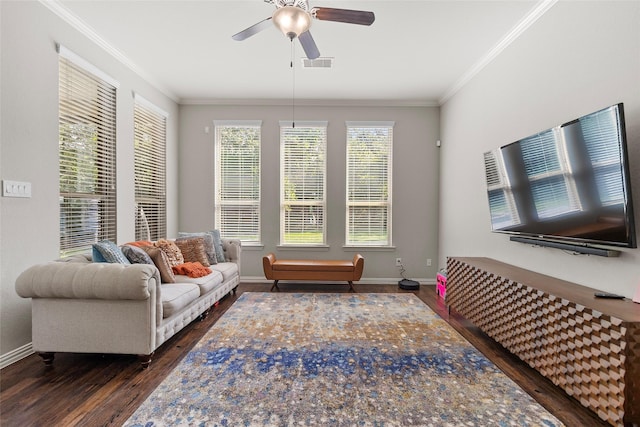 8992 S Comanche Cir, Willis, TX 77378 - living area featuring wood finished floors, ornamental molding, a ceiling fan, and baseboards