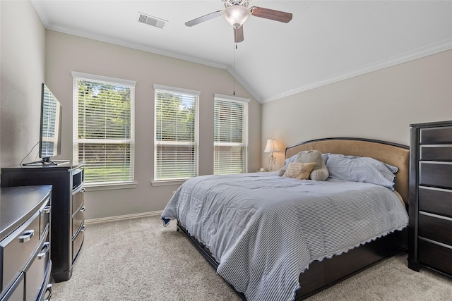 8992 S Comanche Cir, Willis, TX 77378 - bedroom featuring light colored carpet, ornamental molding, baseboards, vaulted ceiling, and ceiling fan