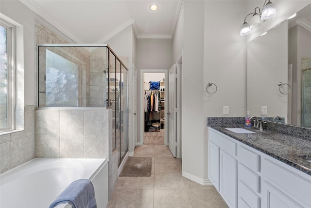 8992 S Comanche Cir, Willis, TX 77378 - full bathroom with a stall shower, vanity, crown molding, a garden tub, and tile patterned flooring