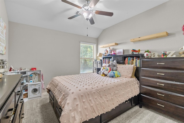 8992 S Comanche Cir, Willis, TX 77378 - bedroom featuring light carpet, vaulted ceiling, and a ceiling fan