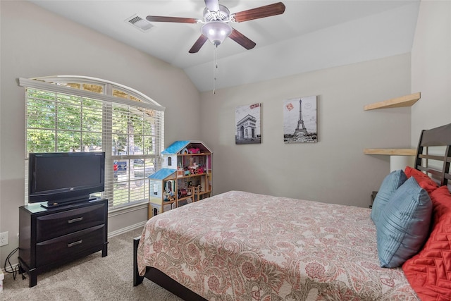 8992 S Comanche Cir, Willis, TX 77378 - bedroom featuring carpet floors, lofted ceiling, baseboards, and ceiling fan