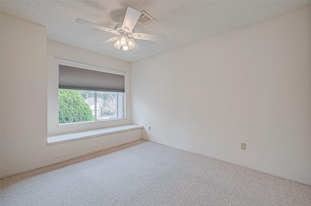 11605 Southlake Dr Unit 32, Houston, TX 77077 - carpeted empty room featuring a textured ceiling, ceiling fan, and baseboards