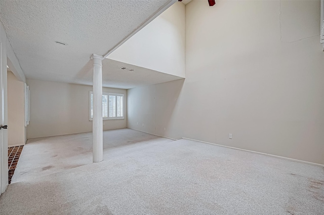 11605 Southlake Dr Unit 32, Houston, TX 77077 - basement with carpet, a textured ceiling, and baseboards