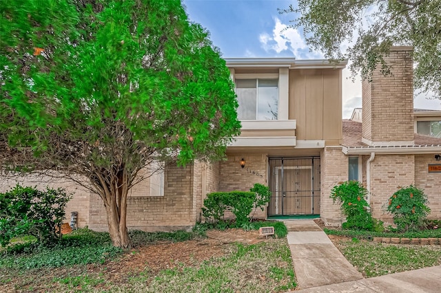 11605 Southlake Dr Unit 32, Houston, TX 77077 - view of front facade with brick siding