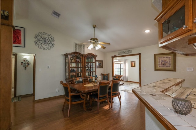 4746 County Road 502d, Sweeny, TX 77480 - dining area featuring wood finished floors, a ceiling fan, vaulted ceiling, baseboards, and recessed lighting