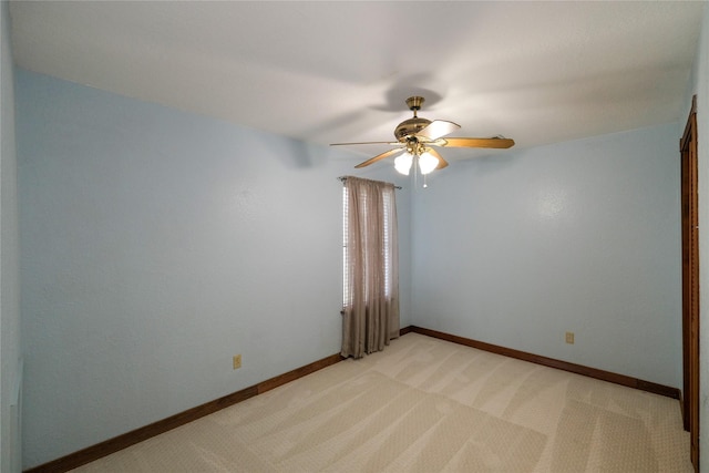 4746 County Road 502d, Sweeny, TX 77480 - unfurnished room with a ceiling fan, light carpet, and baseboards