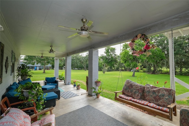 4746 County Road 502d, Sweeny, TX 77480 - porch with ceiling fan and a lawn