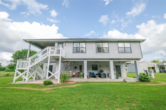 4746 County Road 502d, Sweeny, TX 77480 - rear view of property with ceiling fan, a yard, a patio area, and stairs