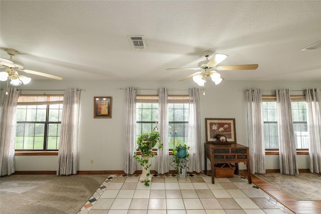 4746 County Road 502d, Sweeny, TX 77480 - living area with ceiling fan and baseboards