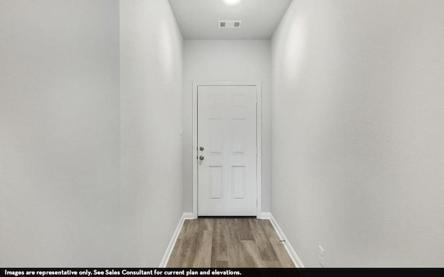 3523 Prairie Rose Trl, Angleton, TX 77515 - hall featuring wood finished floors and baseboards