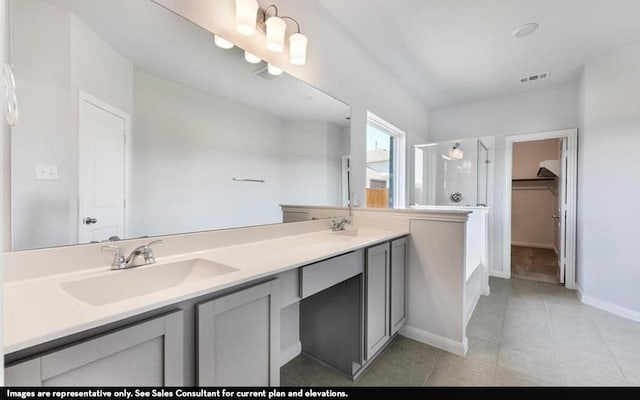3523 Prairie Rose Trl, Angleton, TX 77515 - bathroom with a stall shower, double vanity, a spacious closet, tile patterned flooring, and baseboards