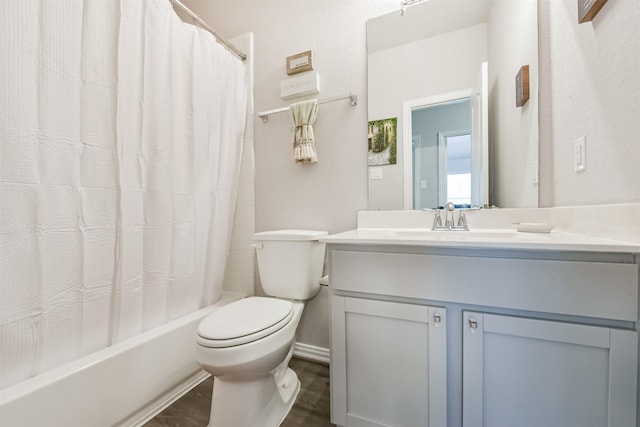 5307 Cascade Ct, Alvin, TX 77511 - full bath featuring toilet, vanity, shower / tub combo with curtain, and wood finished floors