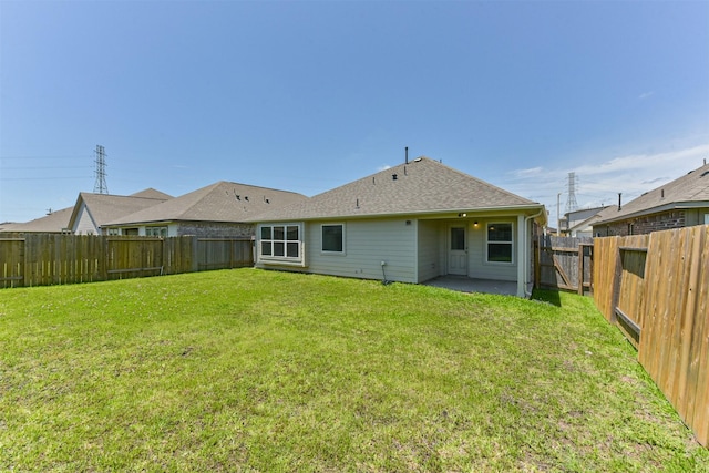 5307 Cascade Ct, Alvin, TX 77511 - rear view of house with a shingled roof and a patio