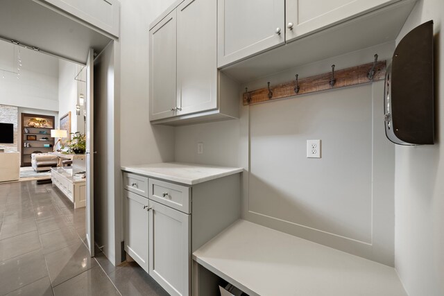 507 Terrace Dr, Houston, TX 77007 - mudroom featuring dark tile patterned flooring