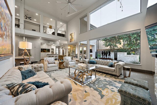 507 Terrace Dr, Houston, TX 77007 - living room featuring a ceiling fan, a towering ceiling, and recessed lighting