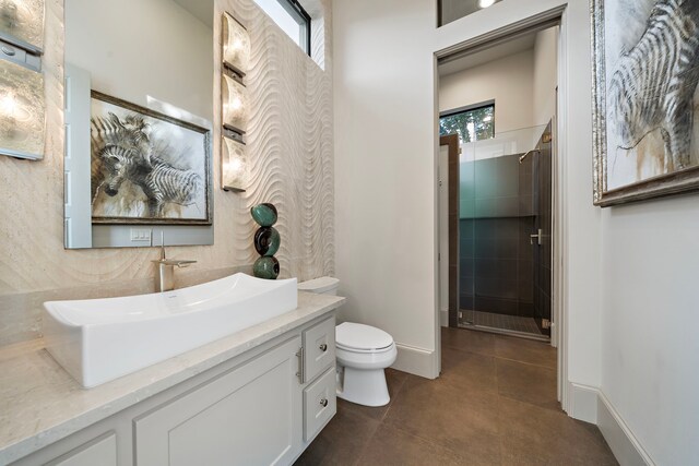 507 Terrace Dr, Houston, TX 77007 - bathroom with vanity, tile patterned floors, toilet, a shower stall, and healthy amount of natural light