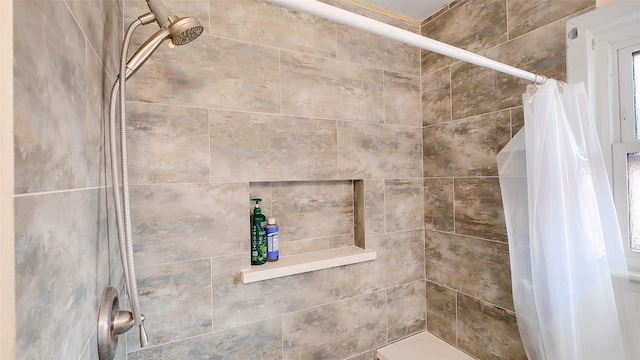 6805 Mobud Dr, Houston, TX 77074 - bathroom featuring a tile shower