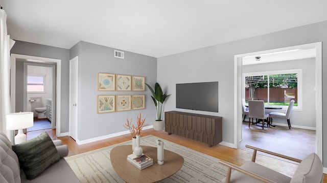 6805 Mobud Dr, Houston, TX 77074 - living room with light wood-style flooring and baseboards