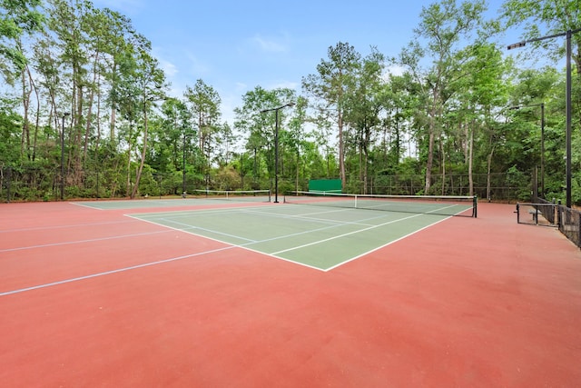150 Rushwing Pl, The Woodlands, TX 77381 - view of tennis court with community basketball court
