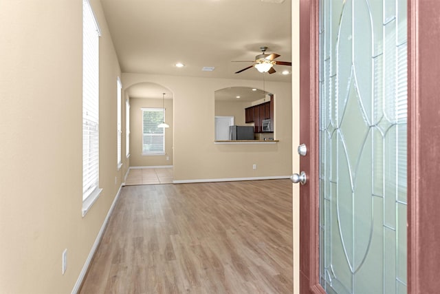 24734 Colonial Maple Dr, Katy, TX 77493 - entrance foyer featuring ceiling fan, light wood finished floors, baseboards, and recessed lighting