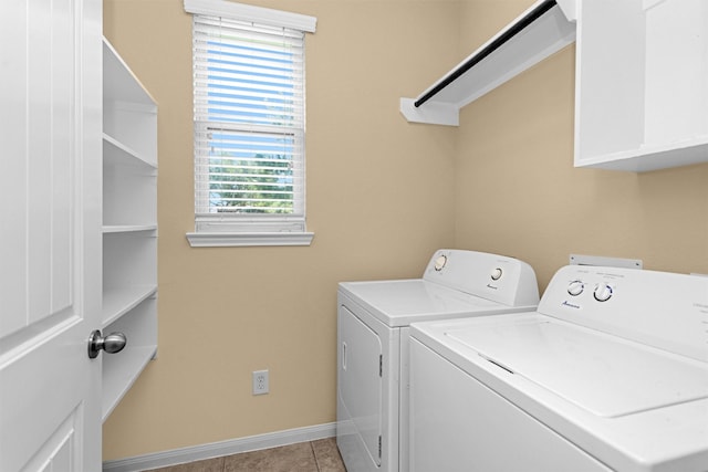 24734 Colonial Maple Dr, Katy, TX 77493 - laundry area featuring washer and dryer, baseboards, and light tile patterned flooring