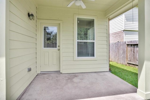 24734 Colonial Maple Dr, Katy, TX 77493 - view of exterior entry with ceiling fan and a patio area