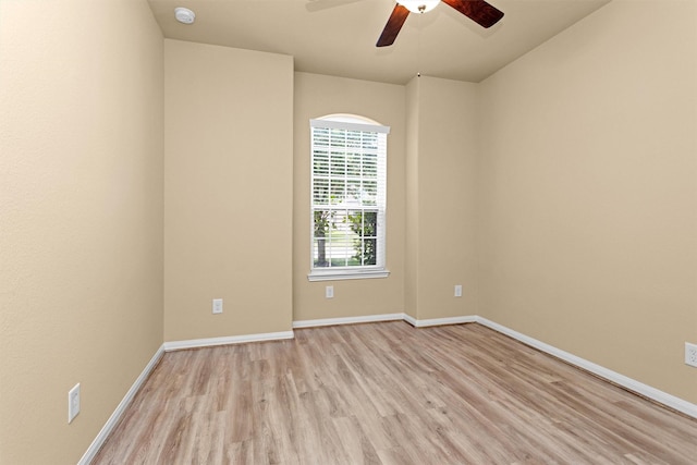 24734 Colonial Maple Dr, Katy, TX 77493 - spare room with light wood-type flooring, a smoke detector, a ceiling fan, and baseboards