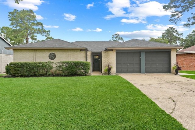 22410 Millgate Dr, Spring, TX 77373 - single story home with an attached garage, driveway, brick siding, and a front yard