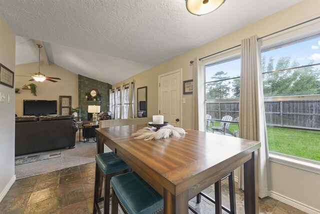 22410 Millgate Dr, Spring, TX 77373 - dining space featuring baseboards, healthy amount of natural light, and a textured ceiling