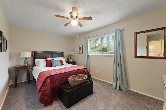 22410 Millgate Dr, Spring, TX 77373 - carpeted bedroom with a textured ceiling, baseboards, and a ceiling fan