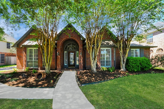 9510 Willowbridge Park Blvd, Houston, TX 77064 - view of front facade featuring brick siding and a front yard