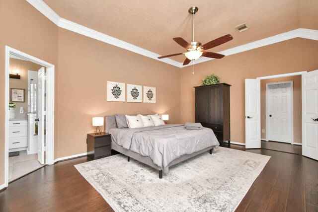 9510 Willowbridge Park Blvd, Houston, TX 77064 - bedroom with crown molding, dark wood-style flooring, baseboards, and ensuite bathroom