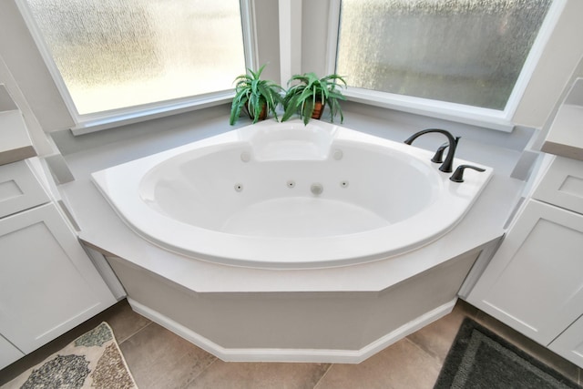 9510 Willowbridge Park Blvd, Houston, TX 77064 - bathroom featuring a whirlpool tub and tile patterned flooring