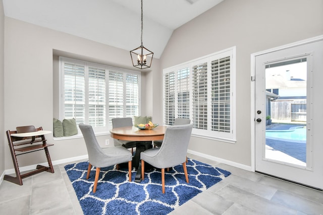 9510 Willowbridge Park Blvd, Houston, TX 77064 - dining space featuring a chandelier, vaulted ceiling, and baseboards
