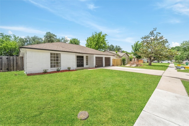 10530 Tenneco Dr, Houston, TX 77099 - ranch-style home featuring concrete driveway, a garage, and brick siding