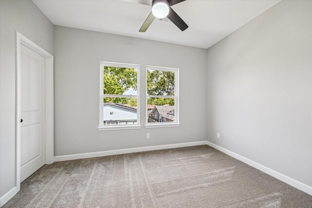 4211 Faulkner St, Houston, TX 77021 - carpeted empty room featuring a ceiling fan and baseboards