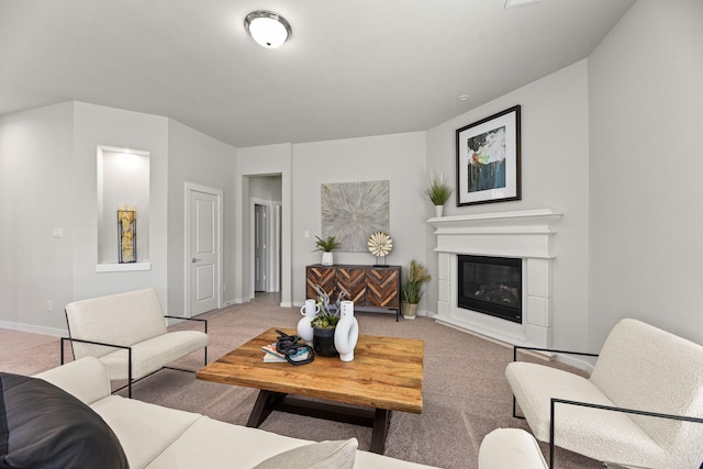 104 Dina Ln, Montgomery, TX 77356 - carpeted living area with baseboards and a glass covered fireplace