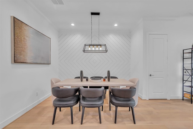 831 E 26th St, Houston, TX 77009 - dining room featuring light wood-type flooring, baseboards, and recessed lighting