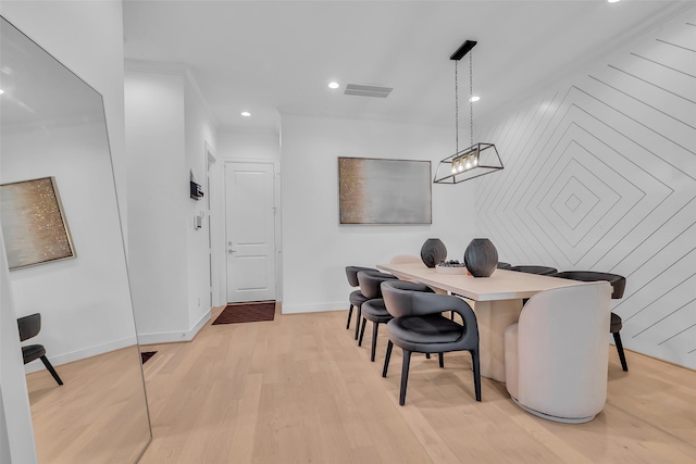 831 E 26th St, Houston, TX 77009 - dining space with light wood-style floors, baseboards, and recessed lighting