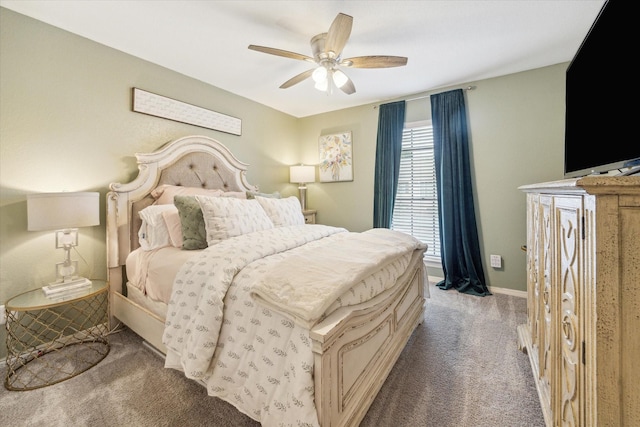 738 Augusta Dr Unit 312, Houston, TX 77057 - bedroom with carpet, a ceiling fan, and baseboards