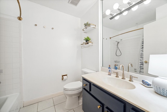 738 Augusta Dr Unit 312, Houston, TX 77057 - full bathroom featuring tile patterned floors, toilet, vanity, and  shower combination