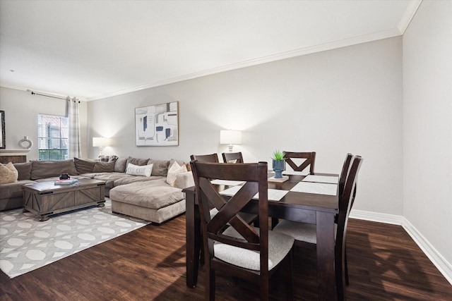 738 Augusta Dr Unit 312, Houston, TX 77057 - dining room featuring wood finished floors, crown molding, and baseboards