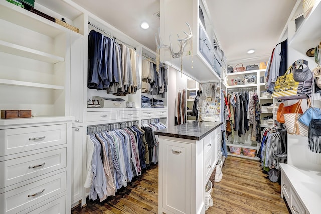 1811 Harvard St, Houston, TX 77008 - spacious closet featuring light wood-style floors