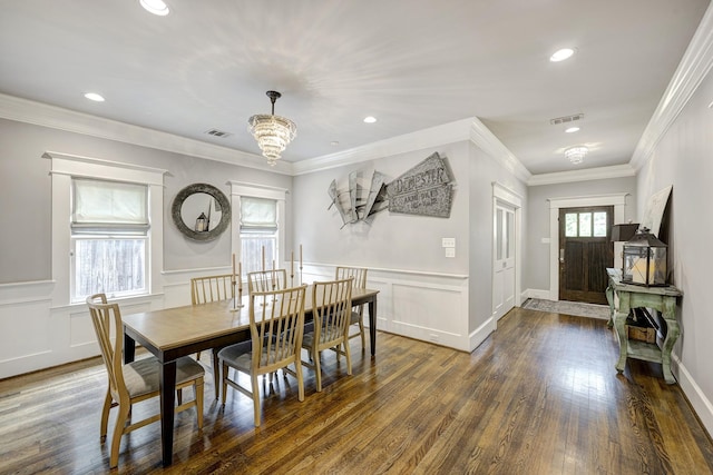 1811 Harvard St, Houston, TX 77008 - dining room with dark wood finished floors, a decorative wall, recessed lighting, a wainscoted wall, and a chandelier