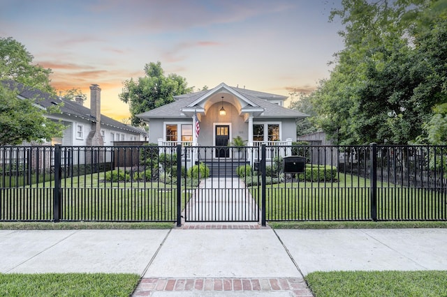 1811 Harvard St, Houston, TX 77008 - bungalow featuring stucco siding, a gate, and a shingled roof