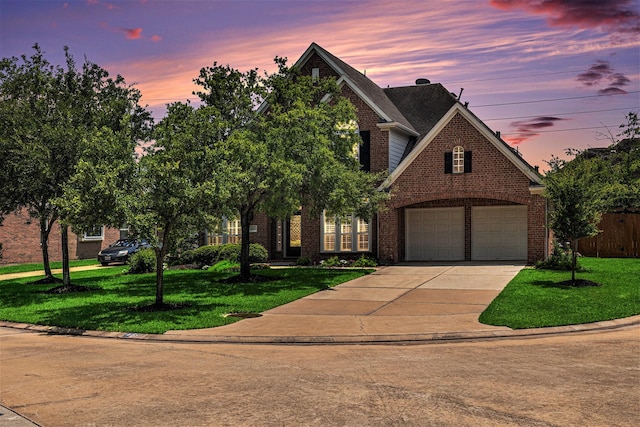 12631 Midland Creek Dr, Tomball, TX 77377 - view of front facade featuring brick siding, driveway, and a garage