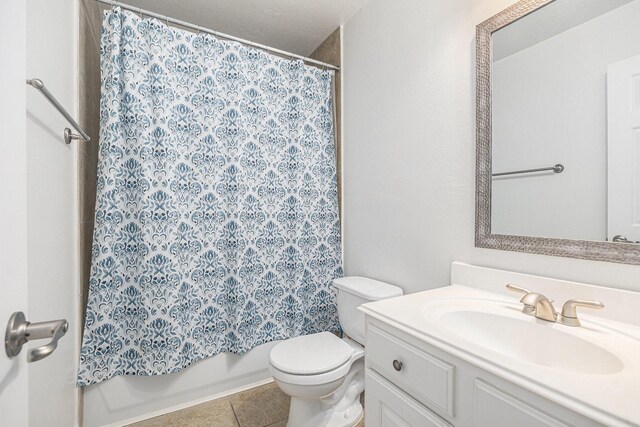 12631 Midland Creek Dr, Tomball, TX 77377 - full bathroom featuring toilet, vanity, tile patterned floors, and shower / tub combo
