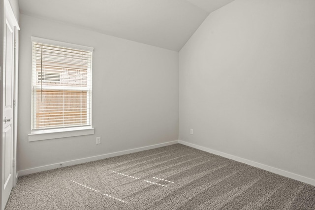 112 Dina Ln, Montgomery, TX 77356 - carpeted spare room with lofted ceiling and baseboards