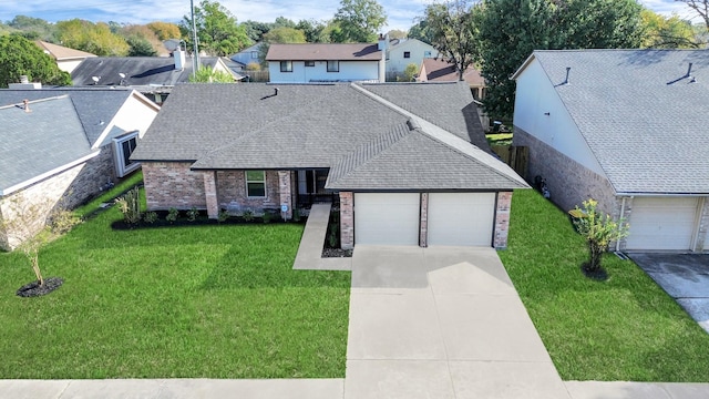 8906 Enchanted Forest Dr, Houston, TX 77088 - ranch-style home featuring brick siding, a shingled roof, concrete driveway, and a front lawn