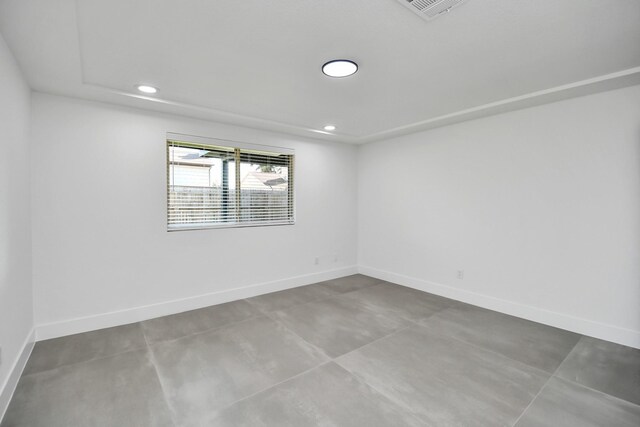 8906 Enchanted Forest Dr, Houston, TX 77088 - empty room with baseboards, finished concrete flooring, and recessed lighting